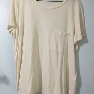 Simple cream colored tshirt.